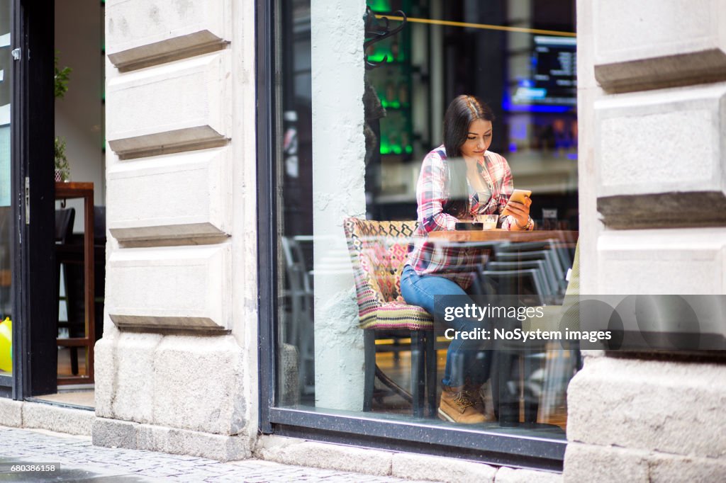 Cute girl enjoy a coffee break