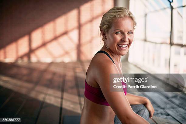 yoga in natural light studio - blonde yoga foto e immagini stock