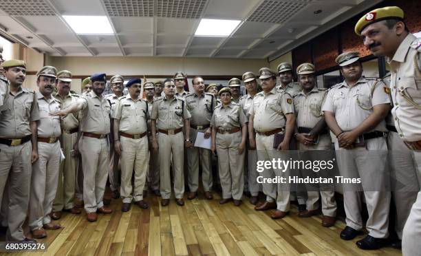 Commissioner of Police Delhi, Amulya Patnaik and Special Commissioner of Police Delhi, Depender Pathak with Senior Police team members during the...