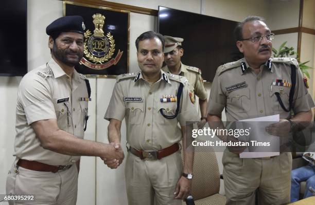 Commissioner of Police Delhi, Amulya Patnaik and Special Commissioner of Police Delhi, Depender Pathak with Senior Police team members during the...