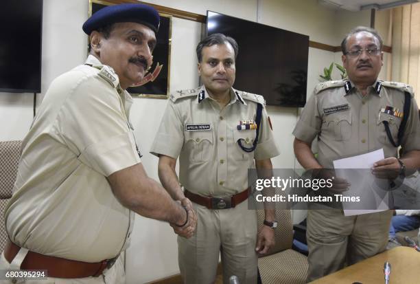 Commissioner of Police Delhi, Amulya Patnaik and Special Commissioner of Police Delhi, Depender Pathak with Senior Police team members during the...