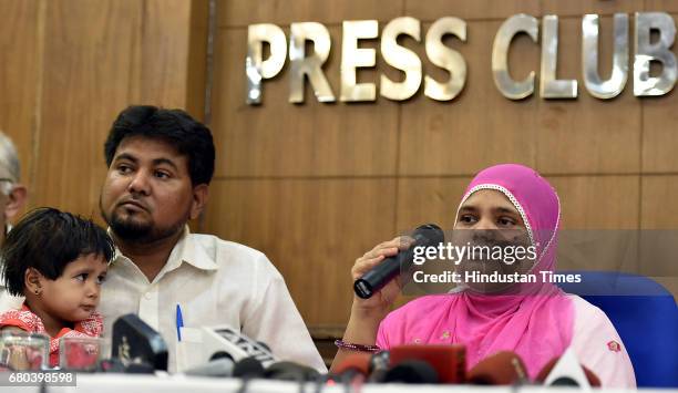 Bilkis Bano, a gangrape survivor from the 2002 Gujarat riots, along with her daughter and husband Yakub Rasool during the press conference after 15...