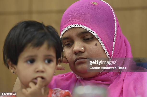 Bilkis Bano, a gangrape survivor from the 2002 Gujarat riots, along with her daughter during the press conference after 15 years Justice at Press...