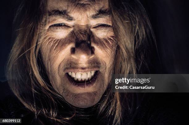 portrait of psychopath woman - psychopath stock pictures, royalty-free photos & images