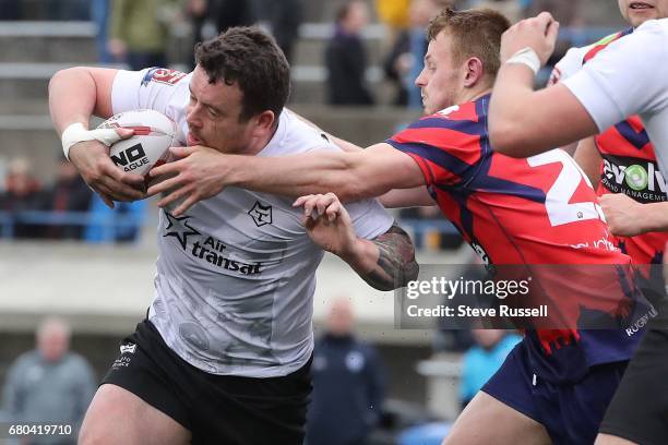 Wolfpack Sean Penkywicz is tackled. The Toronto Wolfpack become the first Rugby Canadian team to play in the Rugby Football League. They beat the...