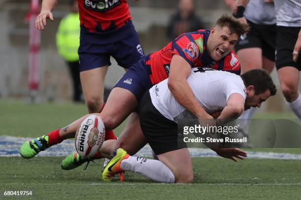 Wolfpack Sean Penkywicz is tackled. The Toronto Wolfpack become the first Rugby Canadian team to play in the Rugby Football League. They beat the...