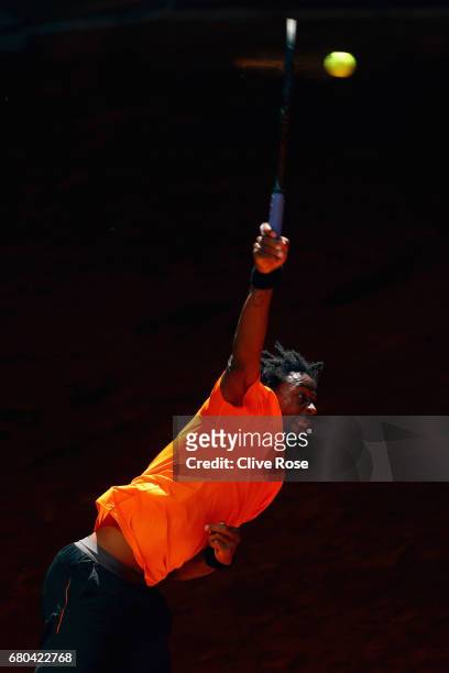 Gael Monfils of France serves during his match against Gilles Simon of France on day three of the Mutua Madrid Open tennis at La Caja Magica on May...