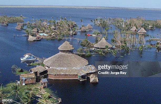 The Tourist Center in Guama near the Bay of Pigs, south of Havana, Cuba lies in ruin November 7, 2001 after Hurricane Michelle swept through the...