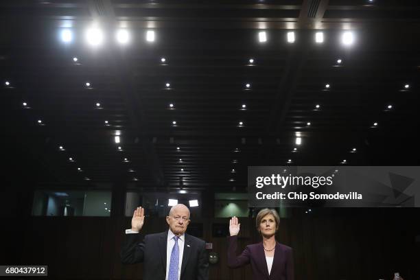 Former Director of National Intelligence James Clapper and former U.S. Deputy Attorney General Sally Yates are sworn in before testifying to the...