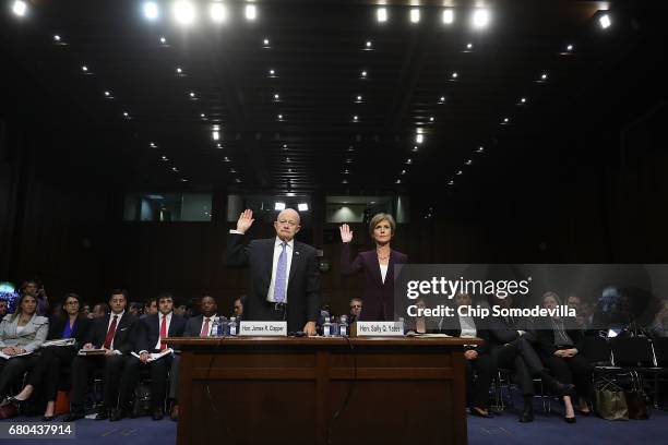 Former Director of National Intelligence James Clapper and former U.S. Deputy Attorney General Sally Yates are sworn in before testifying to the...