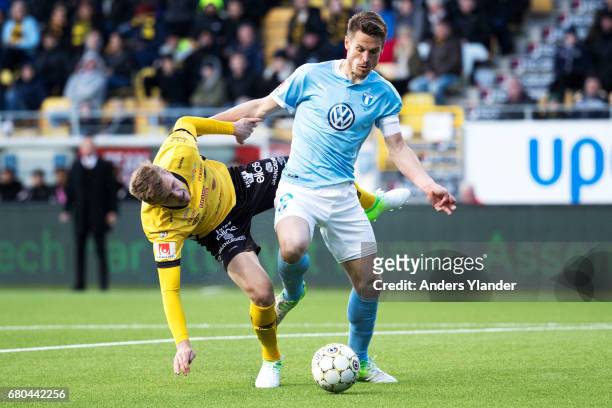 Joakim Nilsson of IF Elfsborg and Markus Rosenberg of Malmo FF competes for the ball during the Allsvenskan match between IF Elfsborg and Malmo FF at...