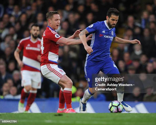 Chelsea's Cesc Fabregas holds off the challenge from Middlesbrough's Adam Forshaw during the Premier League match between Chelsea and Middlesbrough...