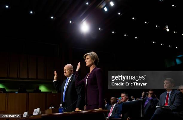 Former Director of National Intelligence James Clapper and former U.S. Deputy Attorney General Sally Yates are sworn in to testify before the Senate...