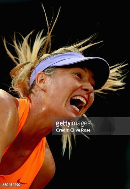 Maria Sharapova of Russia in action during her match against Eugenie Bouchard of Canada on day three of the Mutua Madrid Open tennis at La Caja...