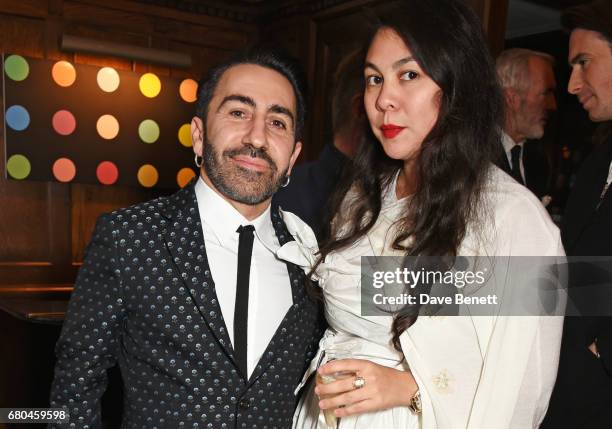 Johnny Coca and Simone Rocha attend a combined celebratory VIP dinner marking The Ivy's centenary year and 150 years of Harper's Bazaar, sponsored by...