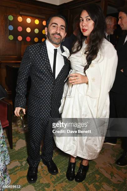 Johnny Coca and Simone Rocha attend a combined celebratory VIP dinner marking The Ivy's centenary year and 150 years of Harper's Bazaar, sponsored by...