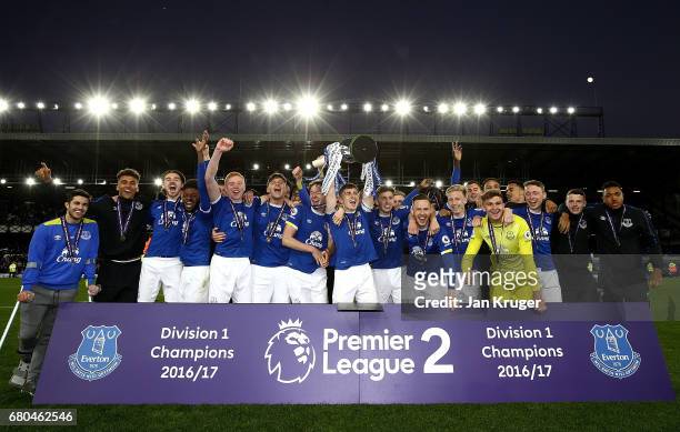 Jonjoe Kenny of Everton lifts the trophy and celebrates winning the league with team mates during the Premier League 2 match between Everton and...