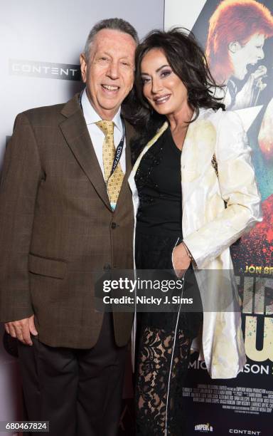 Eliot M Cohen and Nancy Dell'Olio attend the UK Premiere of Jon Brewer's 'BESIDE BOWIE: The Mick Ronson Story' at The Mayfair Hotel on May 08, 2017...