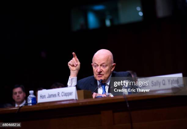 Former Director of National Intelligence James Clapper testifies before the Senate Judiciary Committee's Subcommittee on Crime and Terrorism in the...