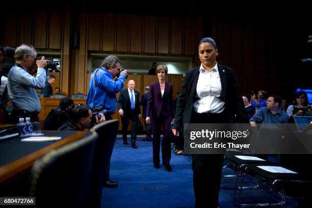 Former Director of National Intelligence James Clapper and former U.S. Deputy Attorney General Sally Yates arrive to testify before the Senate...