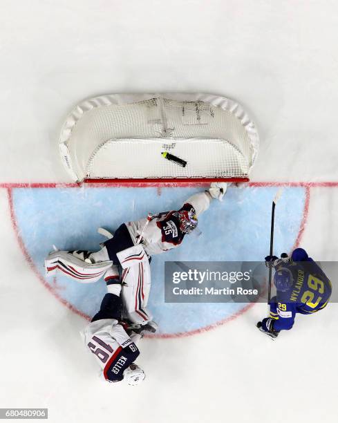 Jimmy Howard, goaltender of USA makes a save against Sweden during the 2017 IIHF Ice Hockey World Championship game between USA and Sweden at Lanxess...