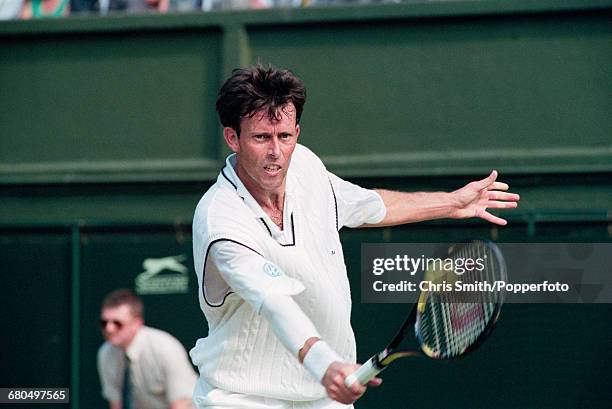 English tennis player Jeremy Bates pictured in action to beat French tennis player Thierry Champion, 7-5, 6-4, 6-7, 4-6, 6-4 in the third round of...