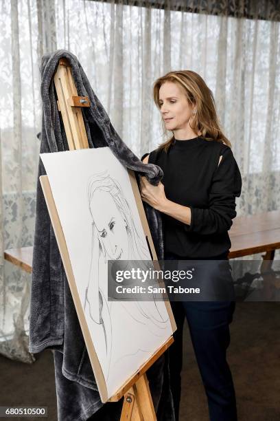 Rachel Griffiths unveils her portrait at The Olsen Hotel in aid of 'No Robe' Campaign on May 9, 2017 in Melbourne, Australia.