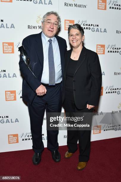 Honoree Robert De Niro and FSLC Executive Director Lesli Klainberg backstage during the 44th Chaplin Award Gala at David H. Koch Theater at Lincoln...