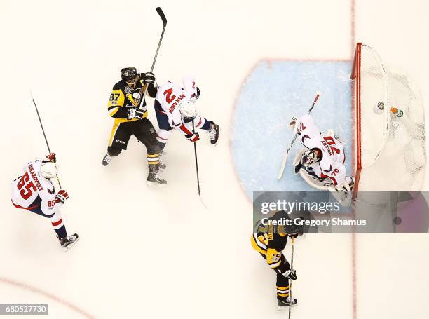 Sidney Crosby of the Pittsburgh Penguins skates against Matt Niskanen of the Washington Capitals in Game Six of the Eastern Conference Second Round...