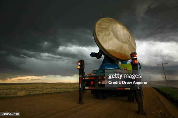 The Doppler on Wheels vehicle scans a supercell thunderstorm during a tornado research mission, May 8, 2017 in Elbert County near Agate, Colorado....