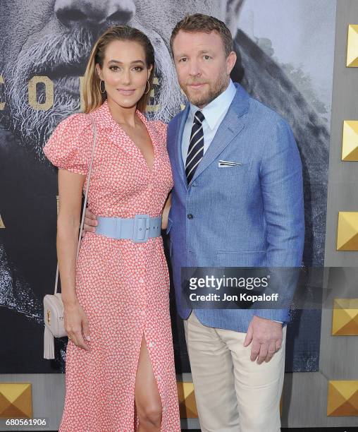Director Guy Ritchie and wife Jacqui Ainsley arrive at the Los Angeles Premiere "King Arthur: Legend Of The Sword" at TCL Chinese Theatre on May 8,...