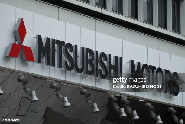 This picture shows the logo of Japan's Mitsubishi Motors Corporation displayed at the company's head office in Tokyo on May 9, 2017. Mitsubishi...