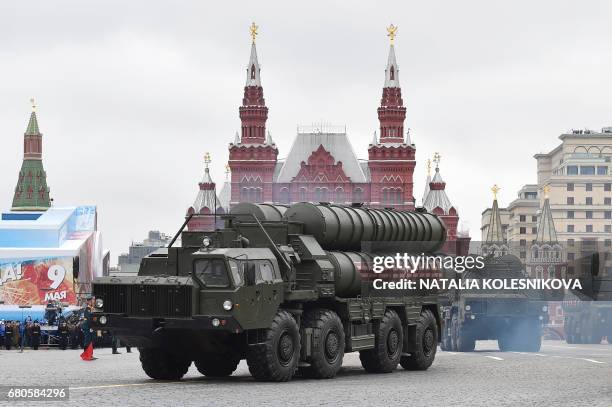 Russian S-400 Triumph medium-range and long-range surface-to-air missile systems ride through Red Square during the Victory Day military parade in...
