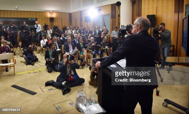 Scott Morrison, Australia's treasurer, speaks to members of the media at a news conference inside the budget lock-up at Parliament House in Canberra,...