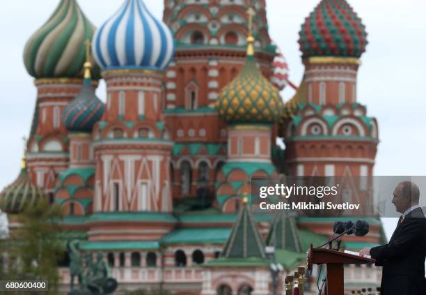 Russian President Vladimir Putin gives a speech as he attends the Victory Day military parade to celebrate the 72nd anniversary of the victory in...