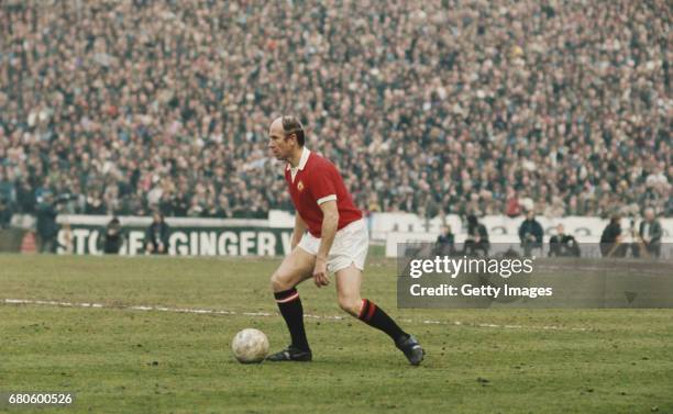 Bobby Charlton of Manchester United runs with the ball during the League Division One match between Chelsea and Manchester United held on April 28,...