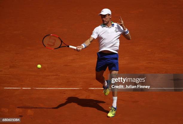 Roberto Bautista Agut of Spain in action in his match against Ivo Karlovic of Croatia during day four of the Mutua Madrid Open tennis at La Caja...