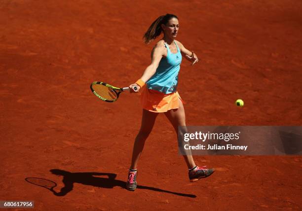Mariana Duque-Marino of Columbia in action against Samantha Stosur of Australia during day four of the Mutua Madrid Open tennis at La Caja Magica on...