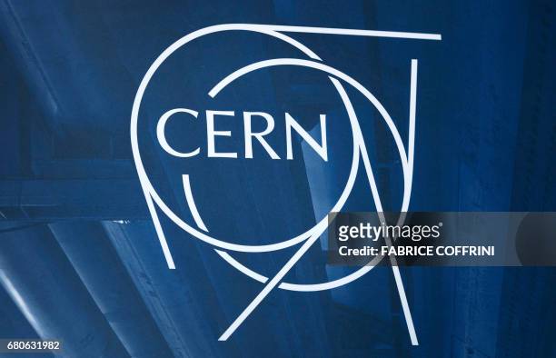 Sign of the European Organisation for Nuclear Research is pictured on May 9, 2017 in Meyrin near Geneva. - CERN inaugurates its linear accelerator,...
