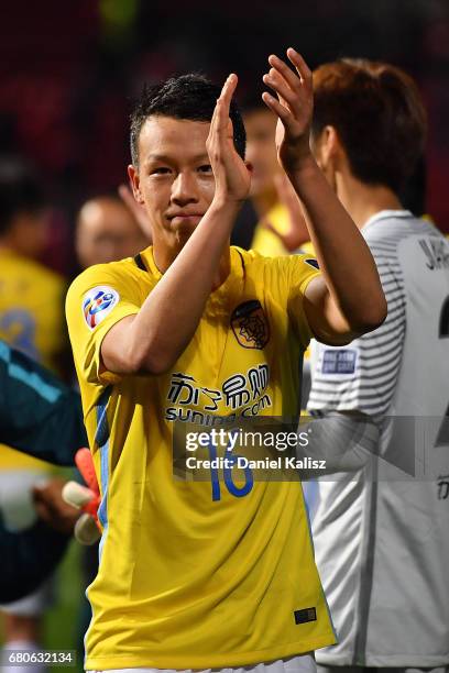 Gao Tianyi of Jiangsu FC waves to the crowd after the AFC Champions League match between Adelaide United and Jiangsu Sainty at Hindmarsh Stadium on...