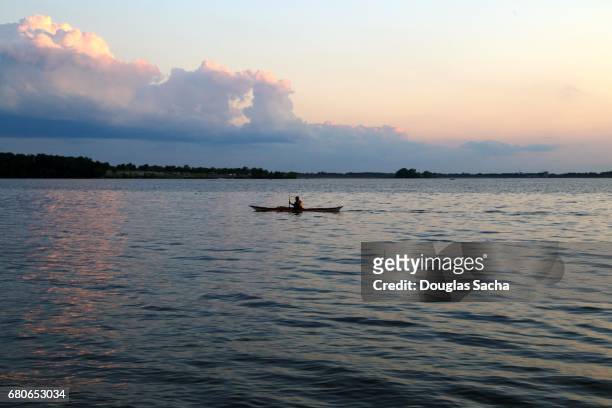 kayaking at sunset, c.j. brown reservoir, buck creek state park, springfield, ohio, usa - springfield ohio stock pictures, royalty-free photos & images