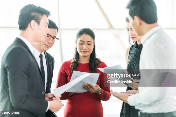white collar worker discuss the details of the project - servant leadership stock pictures, royalty-free photos & images