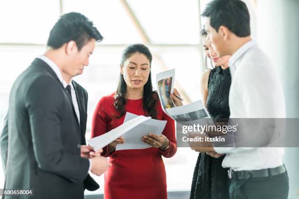 white collar worker discuss the details of the project - servant leadership stock pictures, royalty-free photos & images