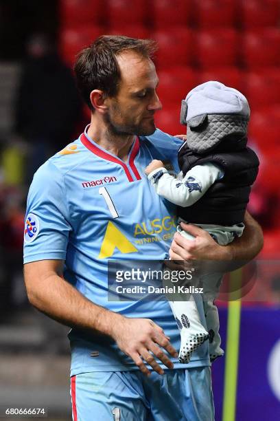 United goalkeeper Eugene Galekovic walks from the field after the AFC Champions League match between Adelaide United and Jiangsu Sainty at Hindmarsh...