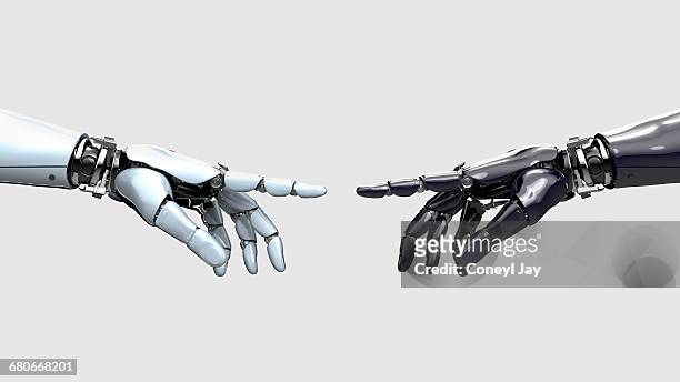black and white robot hand pointing at each other - robotic arm 個照片及圖片檔