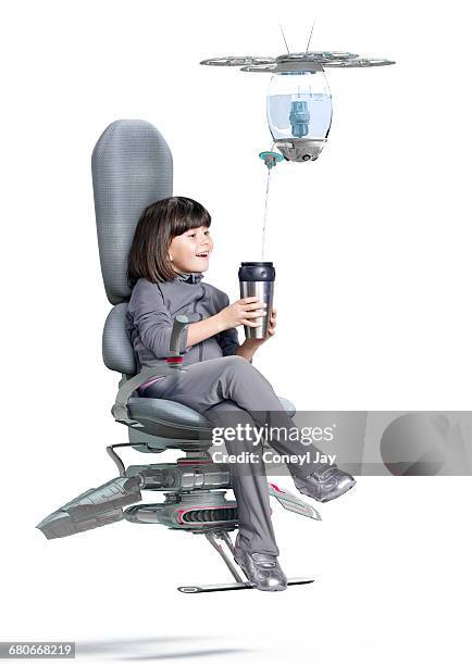 child being served a drink from autonomous drone - child with robot stock pictures, royalty-free photos & images