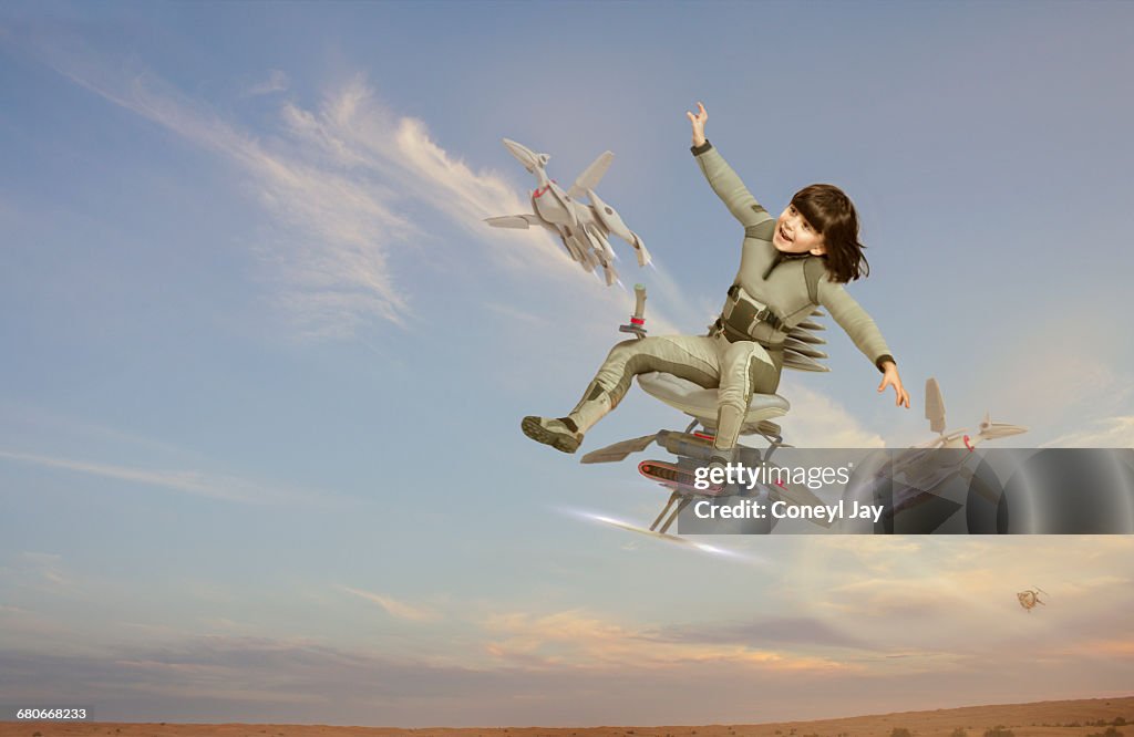 Young girl on futuristic flying chair
