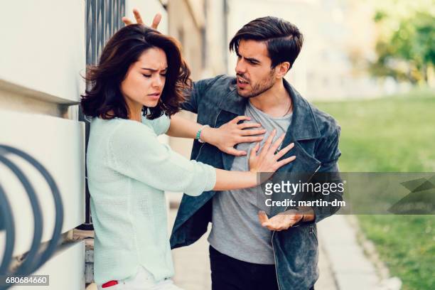 young couple in conflict - fighting stock pictures, royalty-free photos & images