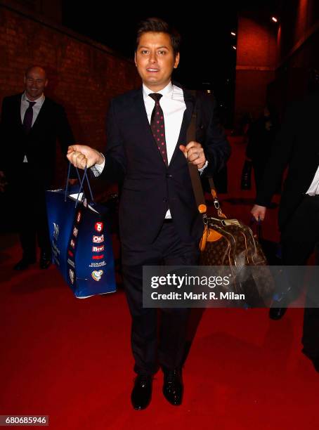 Brian Dowling departs the 60th Birthday Celebration of Richard Desmond at Old Billingsgate Market on December 8, 2011 in London, England.