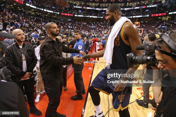 Rapper, Drake greets Tristan Thompson of the Cleveland Cavaliers after Game Four of the Eastern Conference Semifinals against the Toronto Raptors...